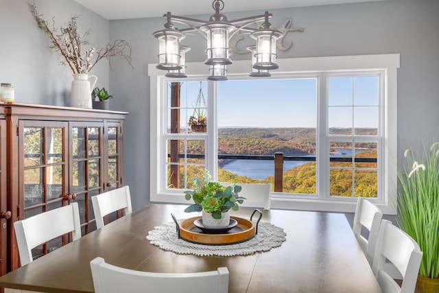 dining space featuring a chandelier