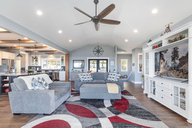 living room with vaulted ceiling, ceiling fan, french doors, and dark hardwood / wood-style floors