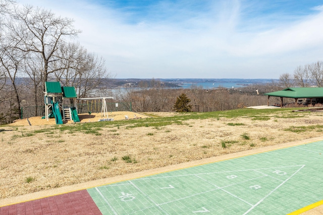 view of home's community with a playground