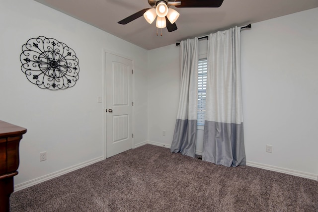 carpeted empty room with ceiling fan