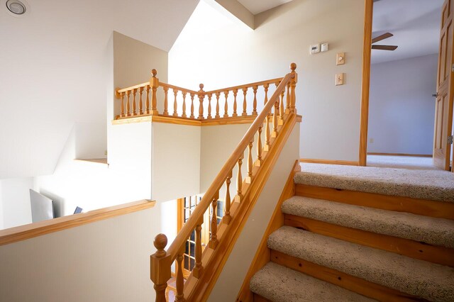 21620 County Road 232, Hermitage, MO 65668 - stairs with ceiling fan and baseboards