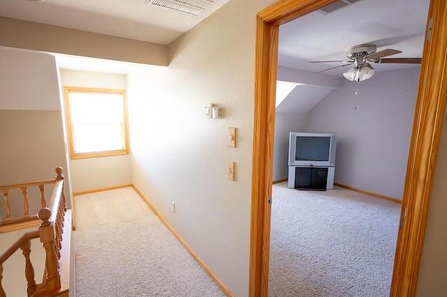 21620 County Road 232, Hermitage, MO 65668 - corridor with vaulted ceiling, baseboards, visible vents, an upstairs landing, and carpet floors
