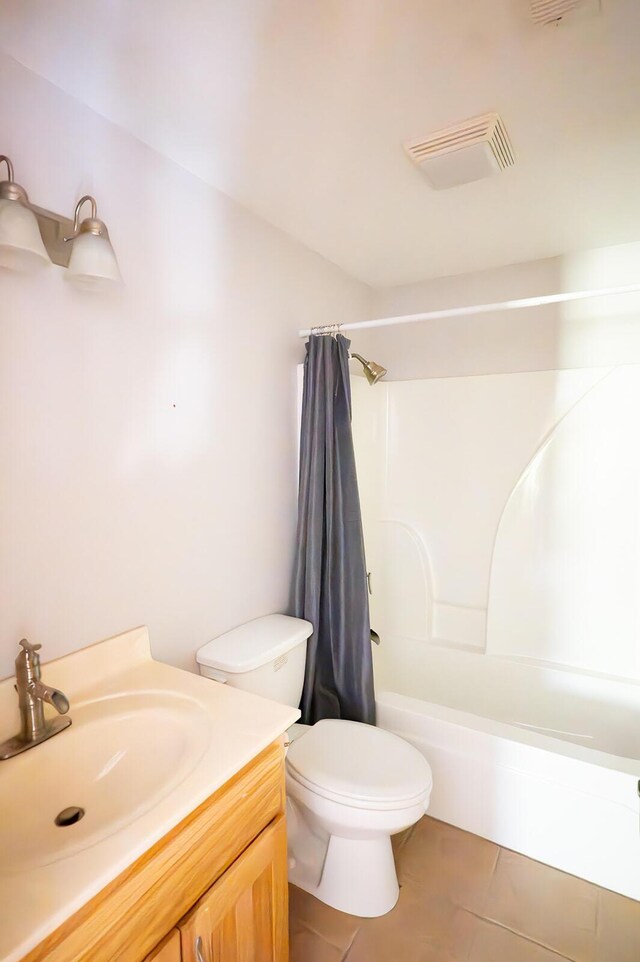 21620 County Road 232, Hermitage, MO 65668 - bathroom with tile patterned floors, shower / bath combo, toilet, visible vents, and vanity