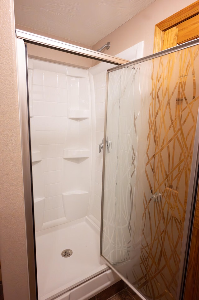 bathroom featuring walk in shower