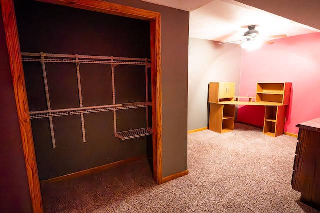 unfurnished bedroom with a closet, ceiling fan, and carpet floors