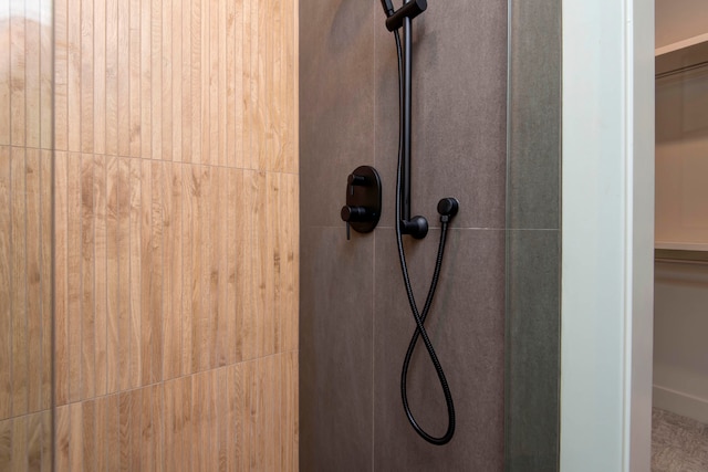 interior details featuring walk in shower