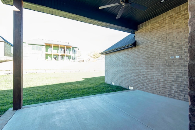 view of patio featuring ceiling fan