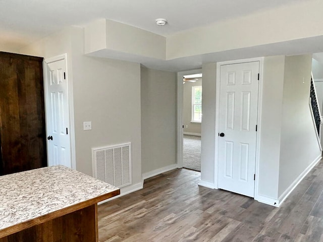 dining room with wood-type flooring