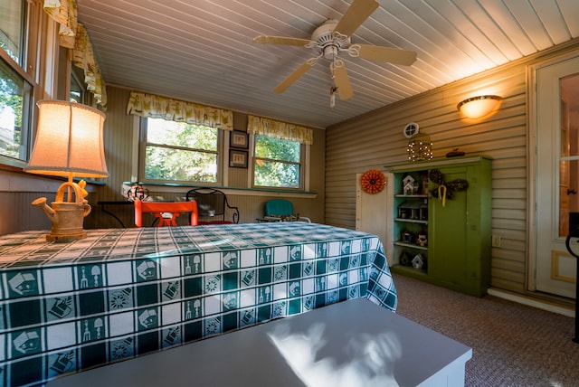 bedroom with ceiling fan and carpet