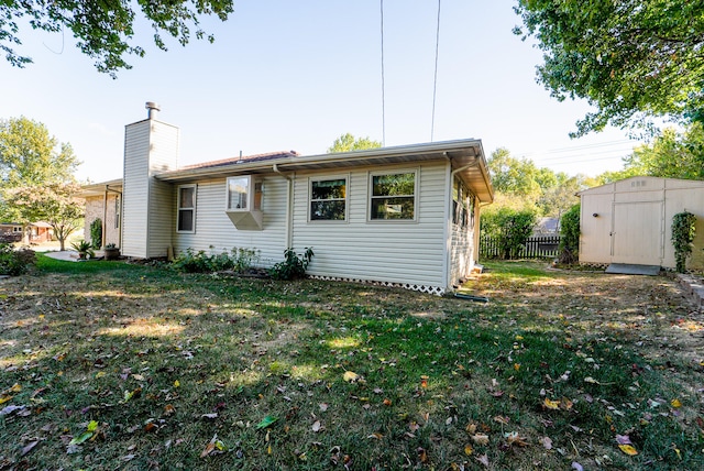 exterior space featuring a shed and a yard