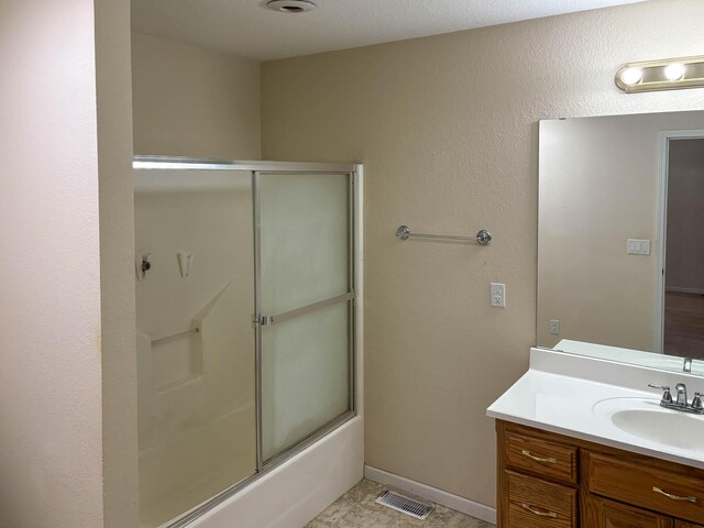 221 Beachwood St, Theodosia, MO 65761 - bathroom with visible vents, vanity, and shower / bath combination with glass door