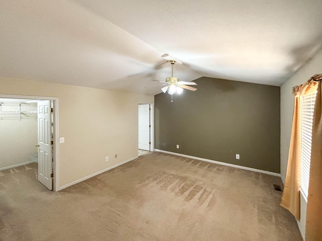 221 Beachwood St, Theodosia, MO 65761 - unfurnished bedroom featuring light carpet, a ceiling fan, vaulted ceiling, and baseboards
