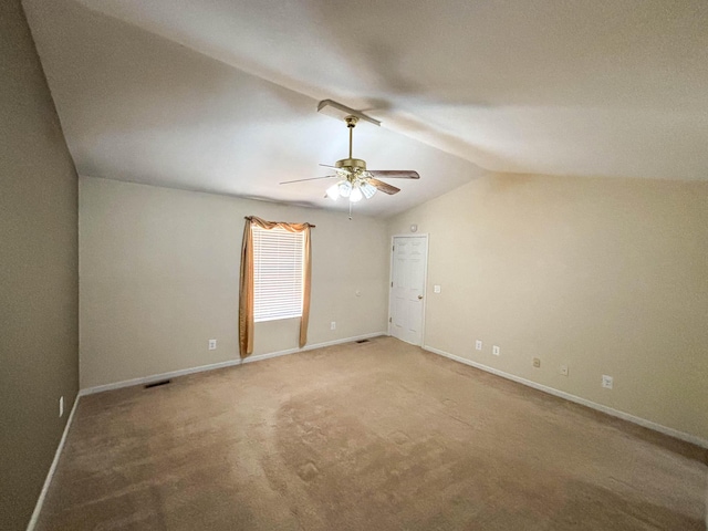 221 Beachwood St, Theodosia, MO 65761 - unfurnished room featuring vaulted ceiling, ceiling fan, baseboards, carpet flooring, and visible vents