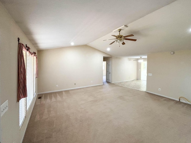 221 Beachwood St, Theodosia, MO 65761 - unfurnished room with lofted ceiling, a ceiling fan, light carpet, and a healthy amount of sunlight