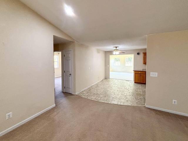 221 Beachwood St, Theodosia, MO 65761 - unfurnished room featuring baseboards, ceiling fan, and light colored carpet