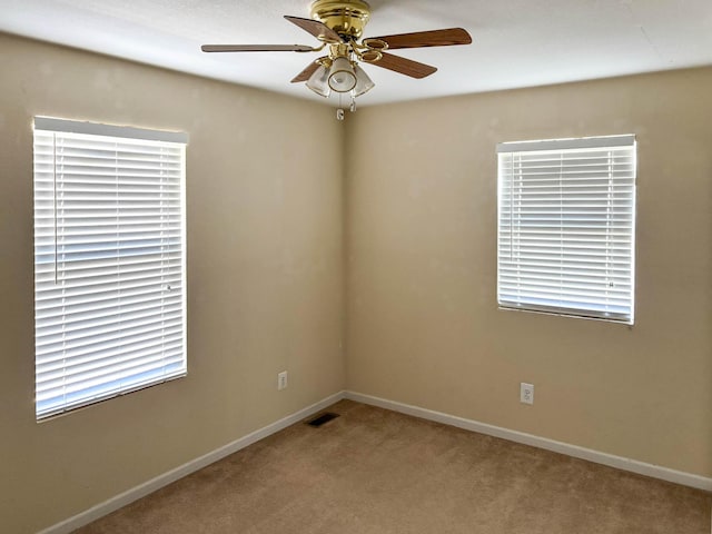 221 Beachwood St, Theodosia, MO 65761 - spare room with ceiling fan, baseboards, carpet flooring, and visible vents