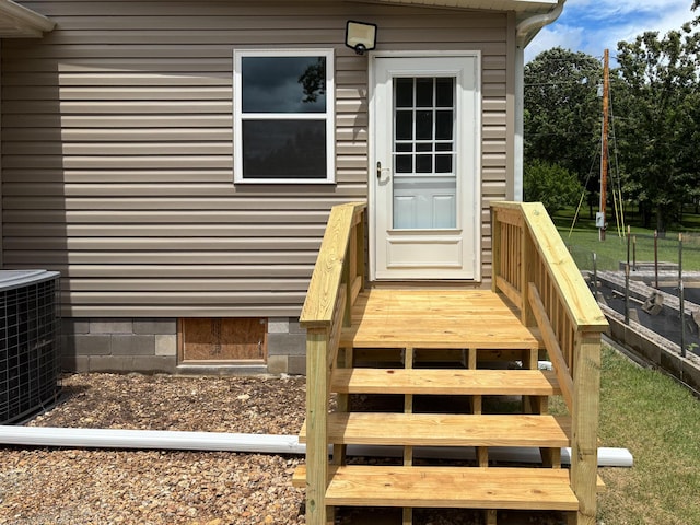 221 Beachwood St, Theodosia, MO 65761 - property entrance featuring central air condition unit