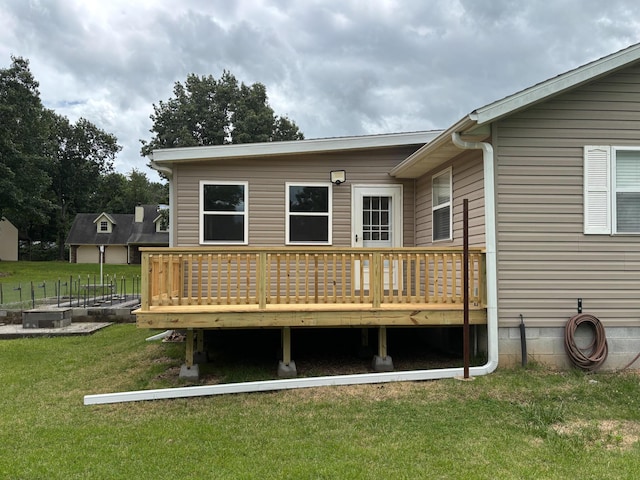 221 Beachwood St, Theodosia, MO 65761 - rear view of house featuring a wooden deck and a yard