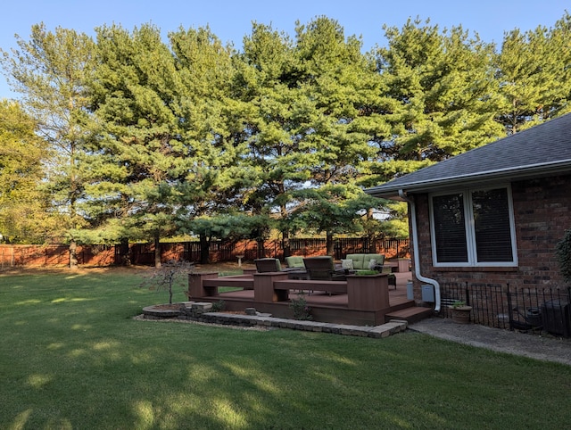 view of yard featuring a deck