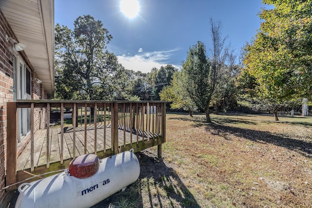 view of yard with a wooden deck