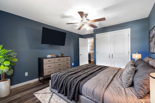 bedroom featuring dark hardwood / wood-style floors, a closet, and ceiling fan