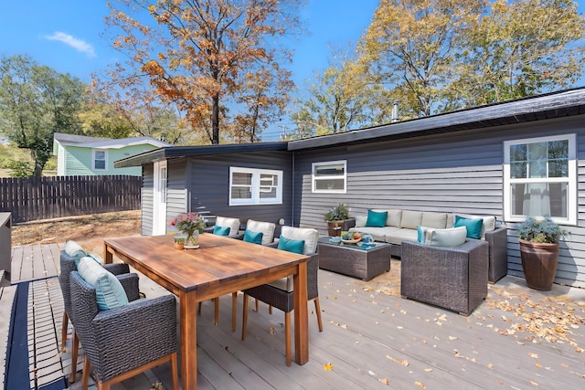 wooden terrace featuring an outdoor hangout area