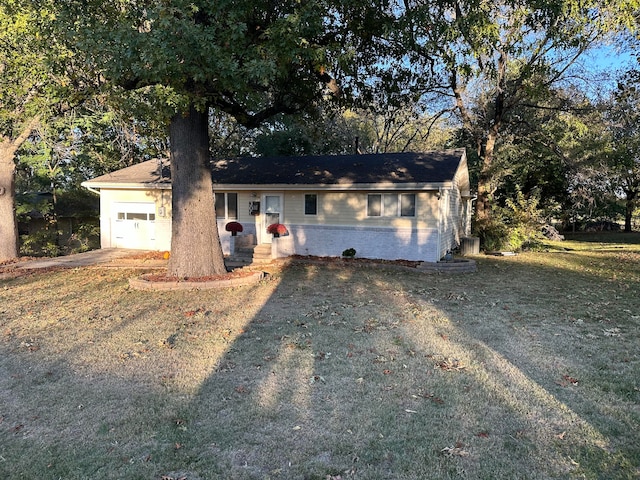 ranch-style house featuring a garage