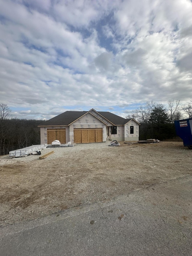 view of front of home with a garage