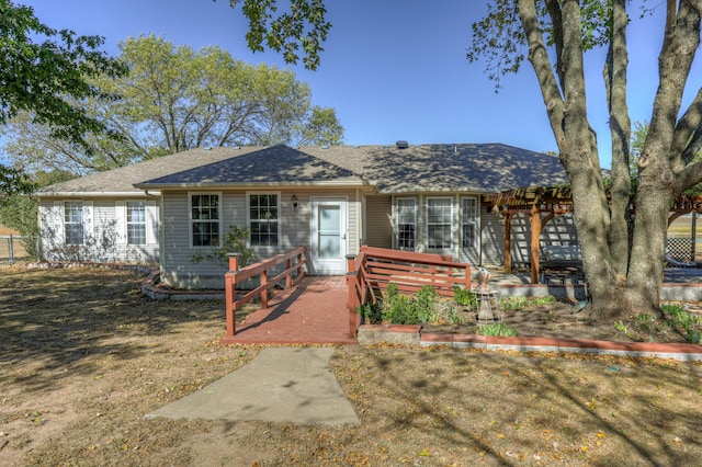 single story home featuring a patio and a pergola