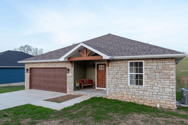 ranch-style home with a garage