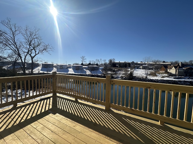 view of snow covered deck