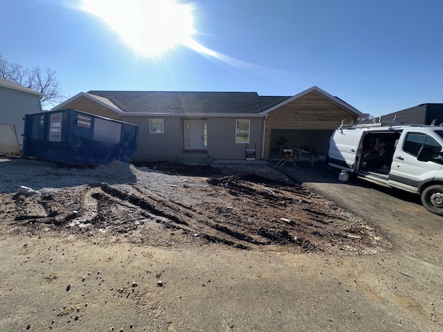 view of front of property featuring a garage