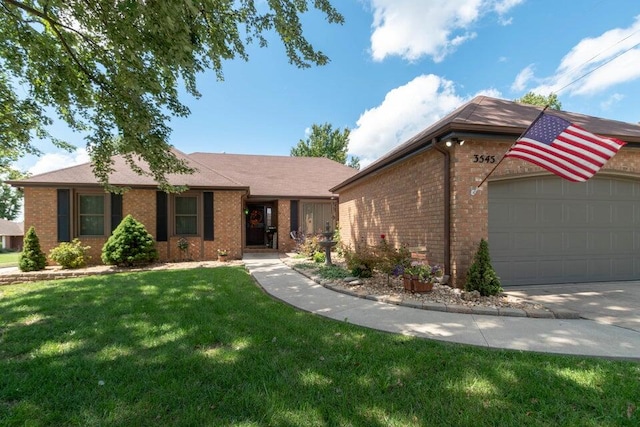 ranch-style house with a front yard and a garage