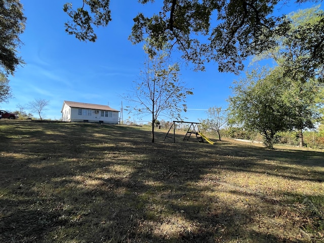 view of yard with a playground