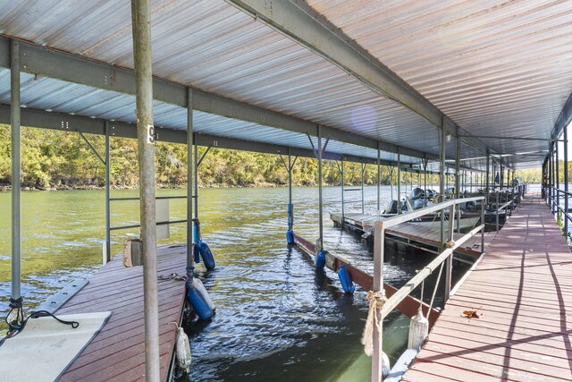 123 River Point Rd Unit 37, Hollister, MO 65672 - dock area with a water view and boat lift