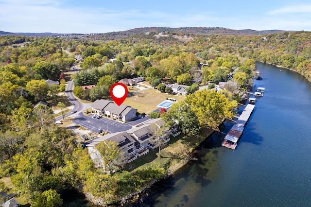 123 River Point Rd Unit 37, Hollister, MO 65672 - bird's eye view of a heavily wooded area and a nearby body of water