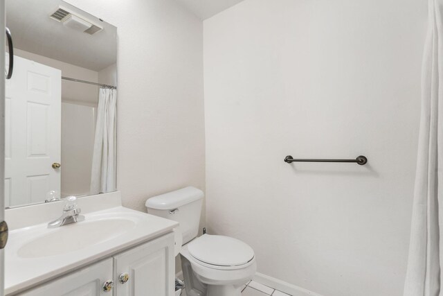123 River Point Rd Unit 37, Hollister, MO 65672 - full bathroom with vanity, tile patterned flooring, and toilet