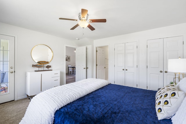 123 River Point Rd Unit 37, Hollister, MO 65672 - bedroom featuring two closets, carpet floors, a ceiling fan, and baseboards
