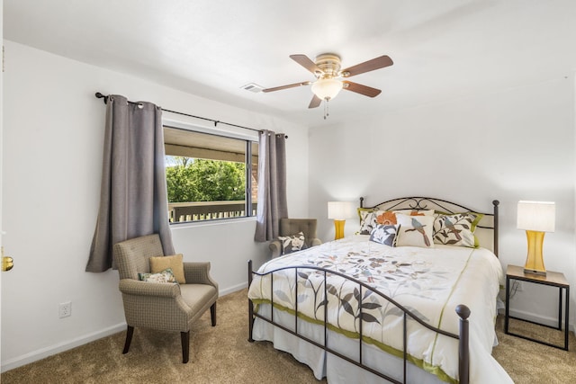 123 River Point Rd Unit 37, Hollister, MO 65672 - carpeted bedroom featuring baseboards and ceiling fan