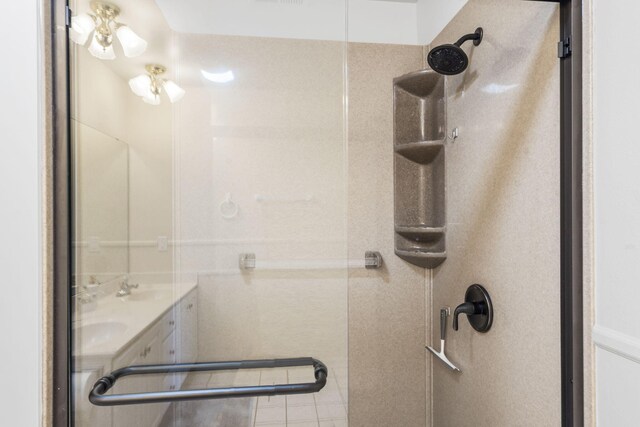 123 River Point Rd Unit 37, Hollister, MO 65672 - full bath featuring a shower, tile patterned floors, and a sink