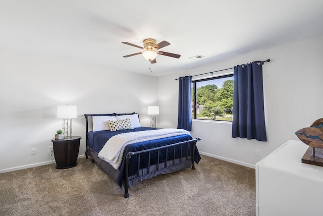 123 River Point Rd Unit 37, Hollister, MO 65672 - carpeted bedroom featuring baseboards and ceiling fan