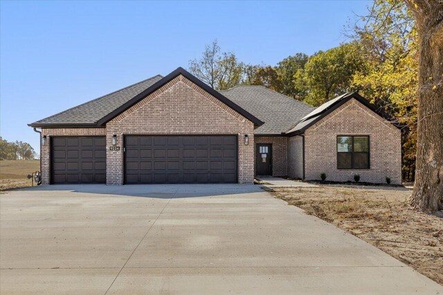 view of front of property featuring a garage