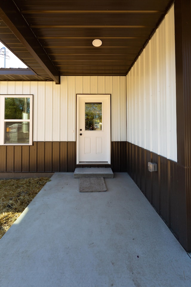 doorway to property with a patio