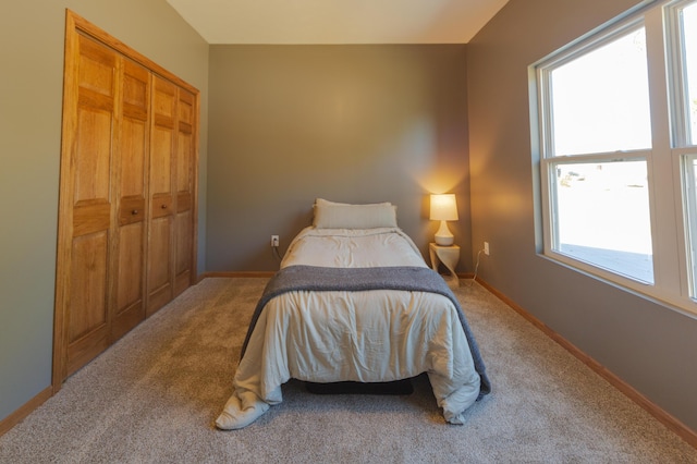 322 W Jefferson St, Bolivar, MO 65613 - bedroom featuring carpet and baseboards