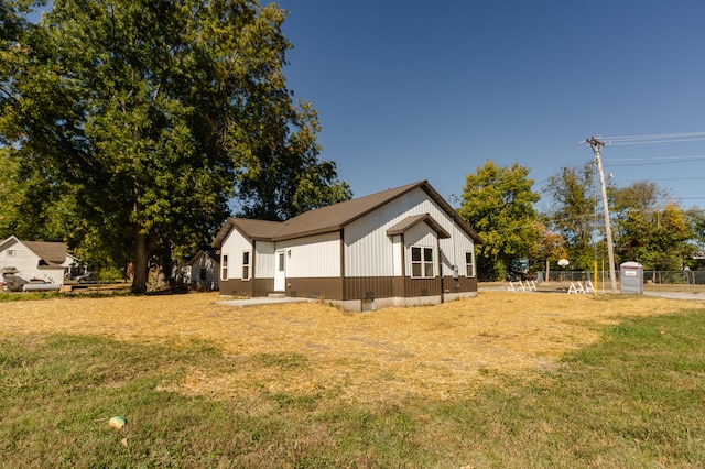 view of home's exterior featuring a yard