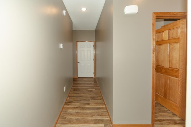 322 W Jefferson St, Bolivar, MO 65613 - hallway featuring wood finished floors, recessed lighting, and baseboards