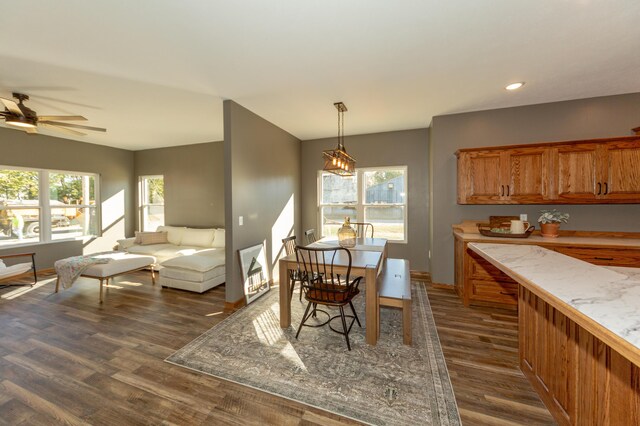 322 W Jefferson St, Bolivar, MO 65613 - dining space featuring dark wood-style flooring, ceiling fan, recessed lighting, and baseboards