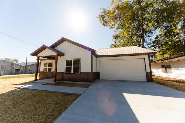 view of front of property featuring a garage