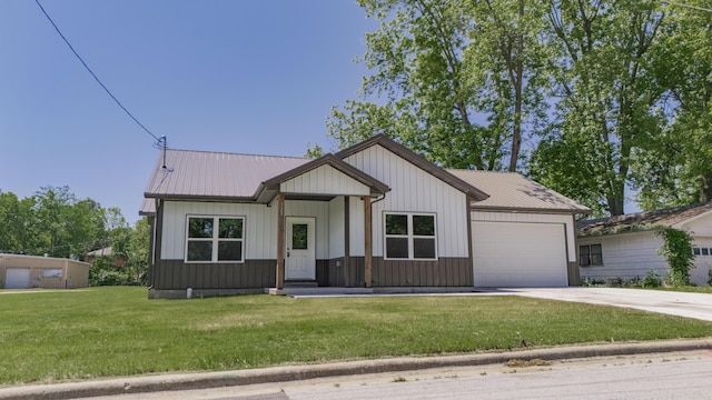 322 W Jefferson St, Bolivar, MO 65613 - modern farmhouse style home featuring a garage, concrete driveway, a front lawn, metal roof, and board and batten siding