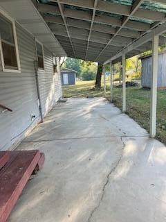 view of patio / terrace with a carport